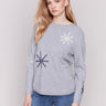 Light grey long-sleeve sweater with snowflake embroidery and rounded hem by Charlie B.