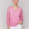 Begonia pink fishnet crochet sweater with a relaxed V-neck by Charlie B.