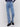 Medium blue flare jeans with laser-cut heart designs, regular rise, and flare leg by Charlie B.