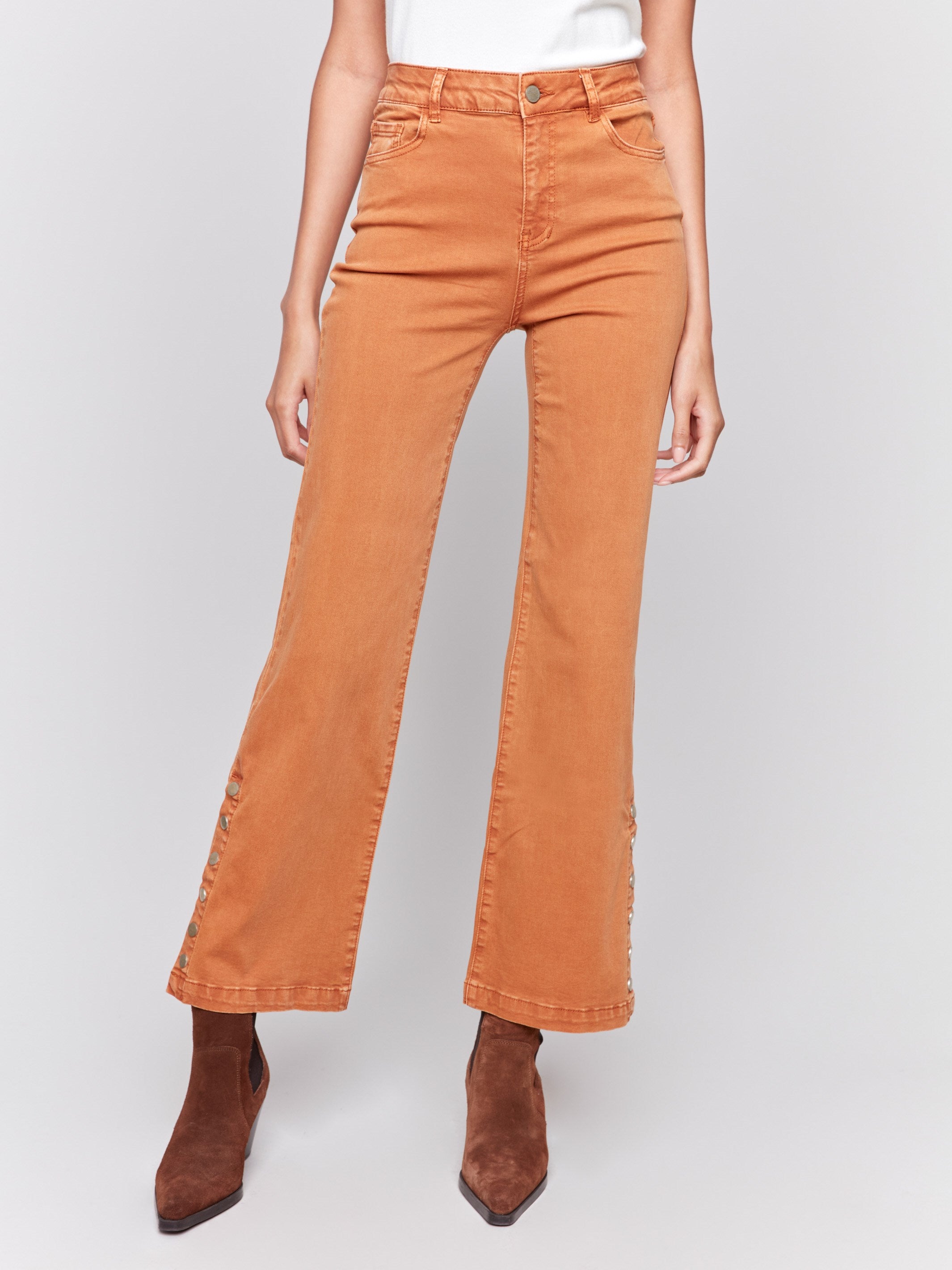 Ginger-colored flare twill jeans with side buttons, featuring a regular rise, five-pocket design, and slim leg fit by Charlie B.