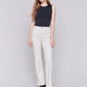 Natural white tone flare twill jeans with side buttons, featuring a five-pocket design and button closure by Charlie B.