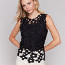 Black crochet top with a crew neckline, featuring a unique design by Charlie B.