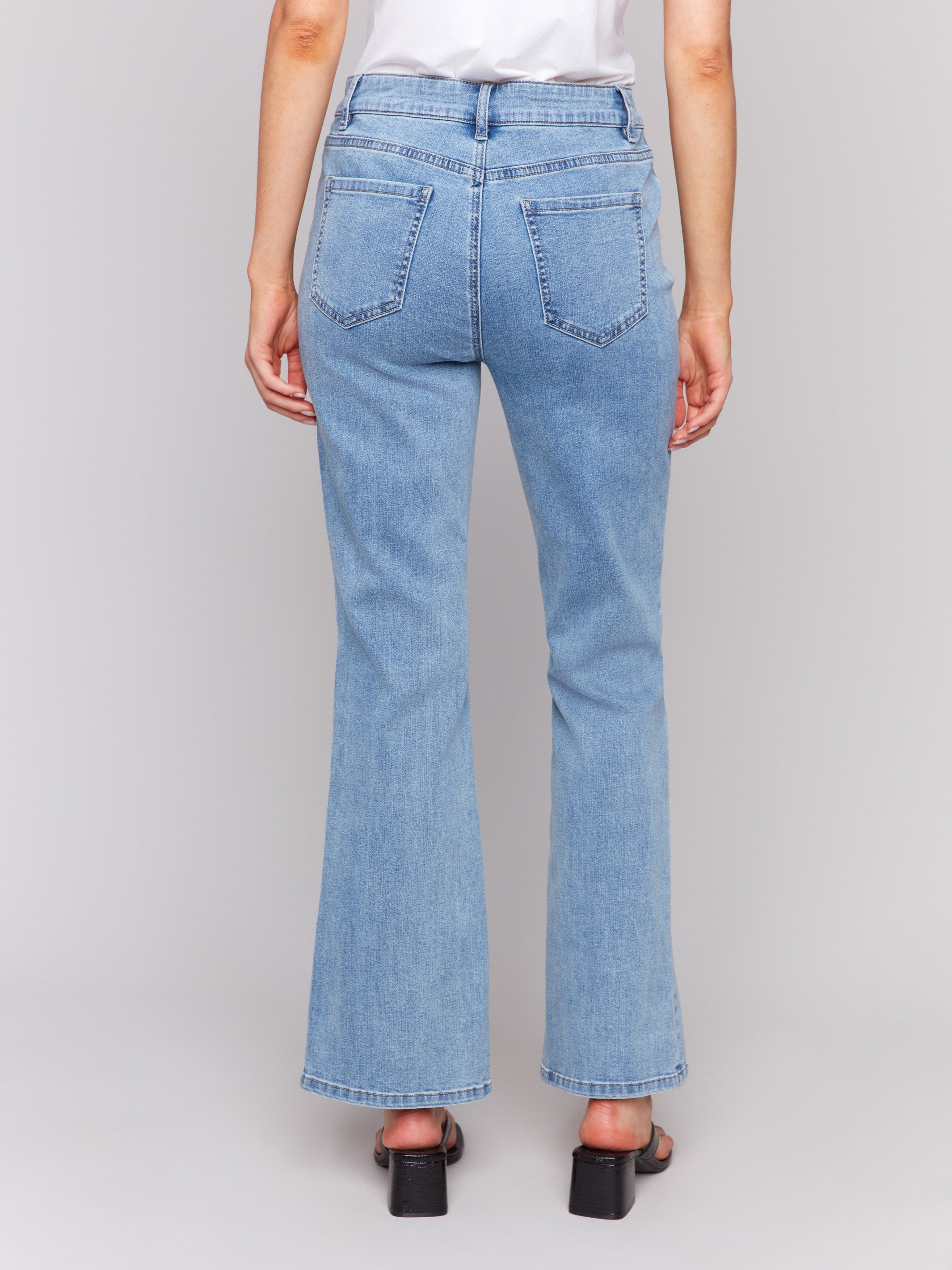 Long length jeans with stylish front slits by Charlie B.