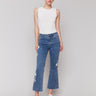 Medium blue jeans with flare leg fit and stretch denim material by Charlie B.