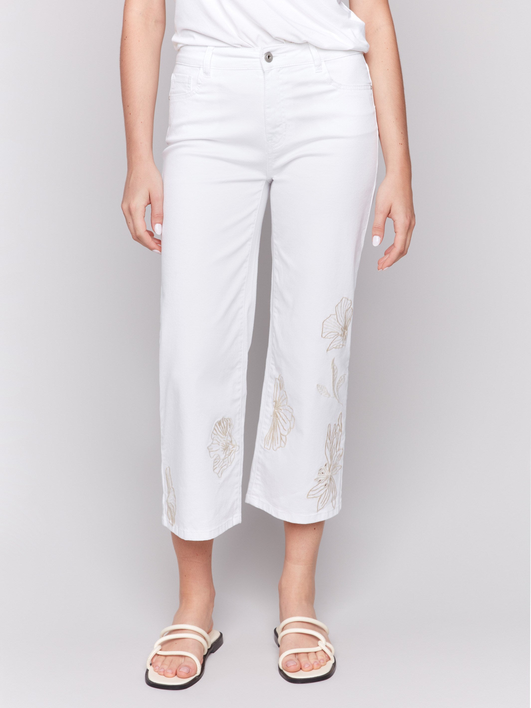 Cropped white pants featuring stretch twill fabric by Charlie B.