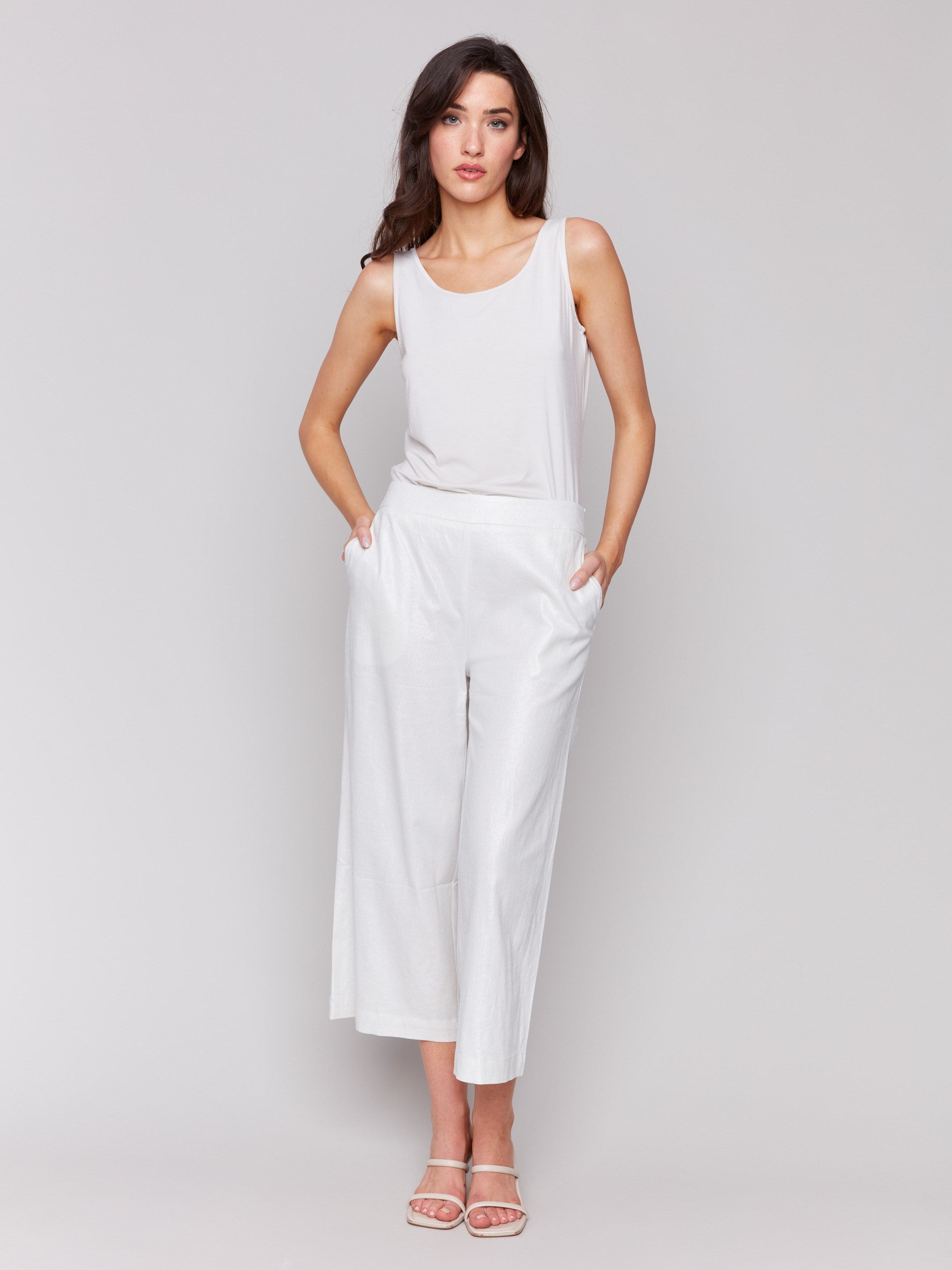 Champagne pants featuring a high-rise waist and elastic at back waistband by Charlie B.