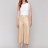 Elegant gold pants in a cropped length, perfect for any occasion by Charlie B.