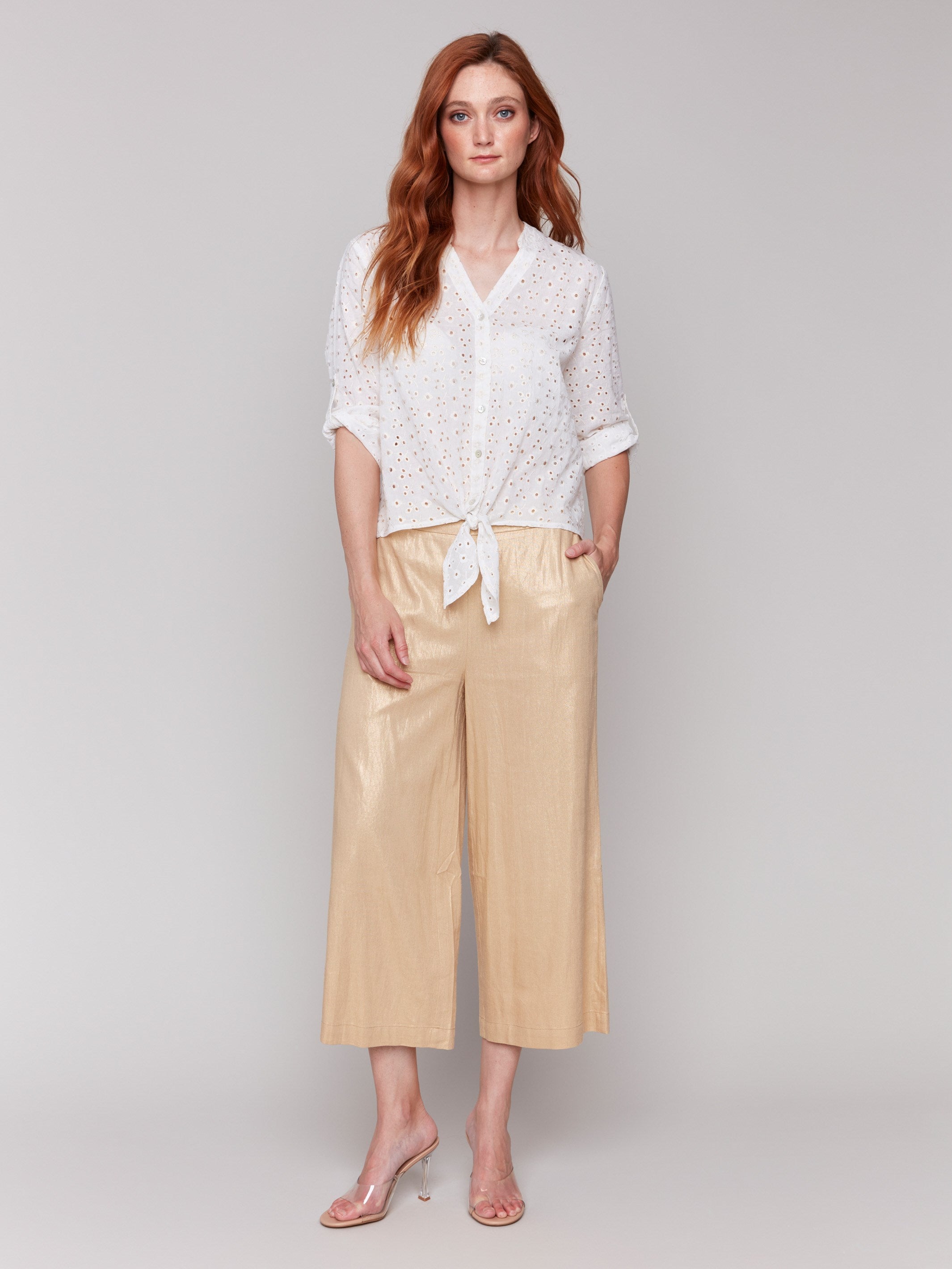 Comfortable stretch fabric in these stylish wide leg gold pants by Charlie B.