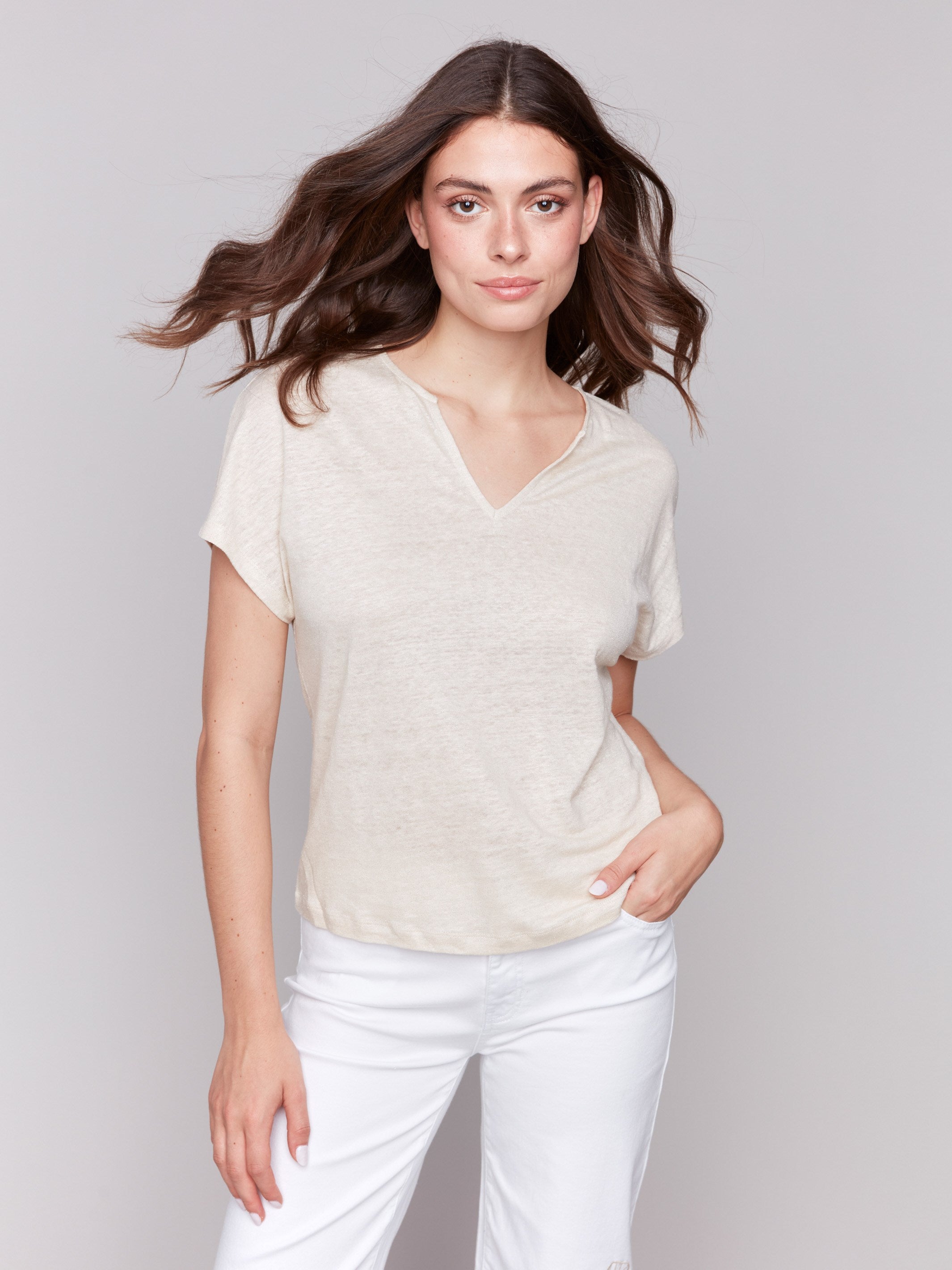 Champagne dolman top featuring a relaxed fit by Charlie B.