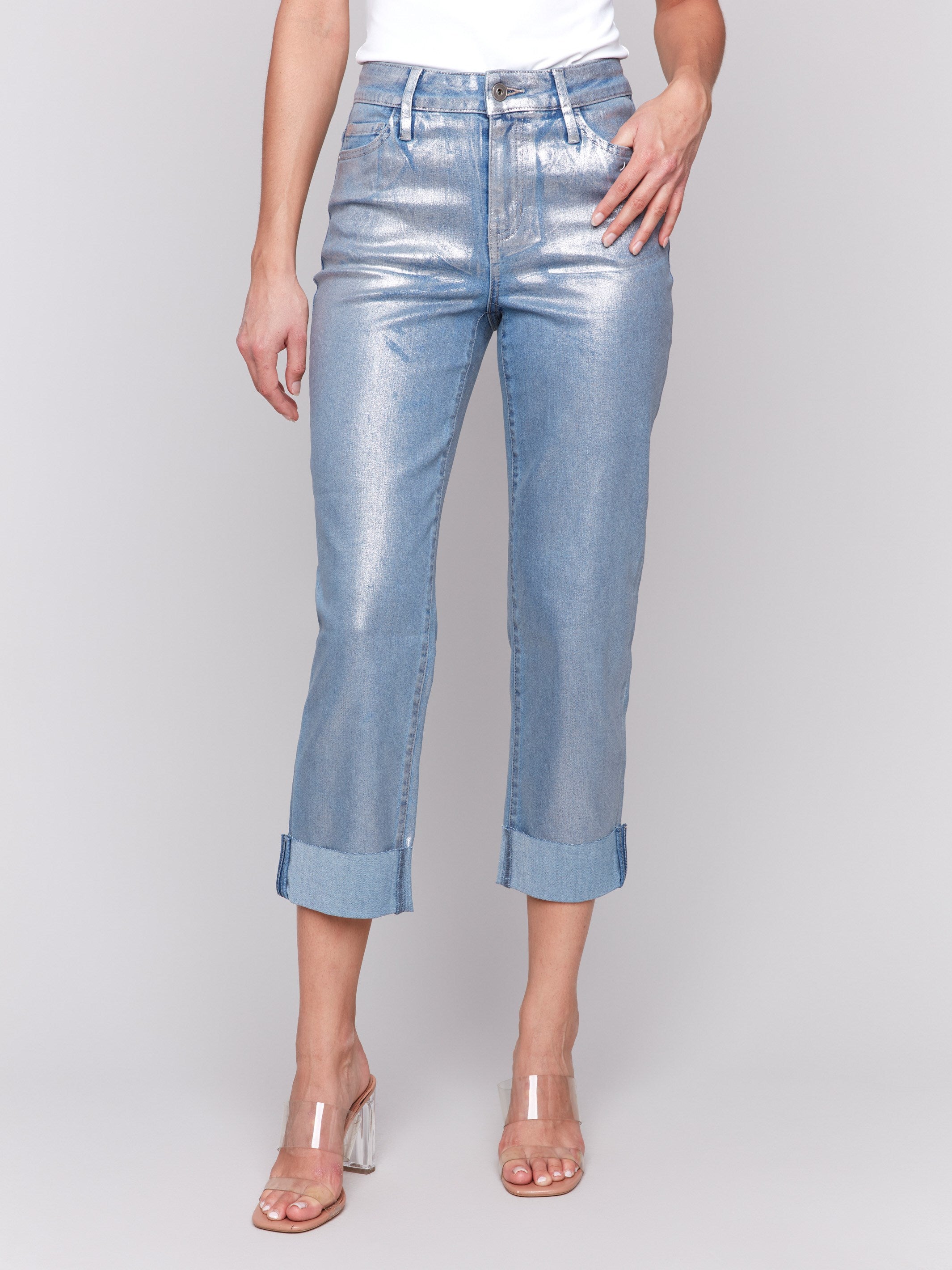 Stylish cropped length pants in bleach blue with a unique foil effect. By Charlie B.