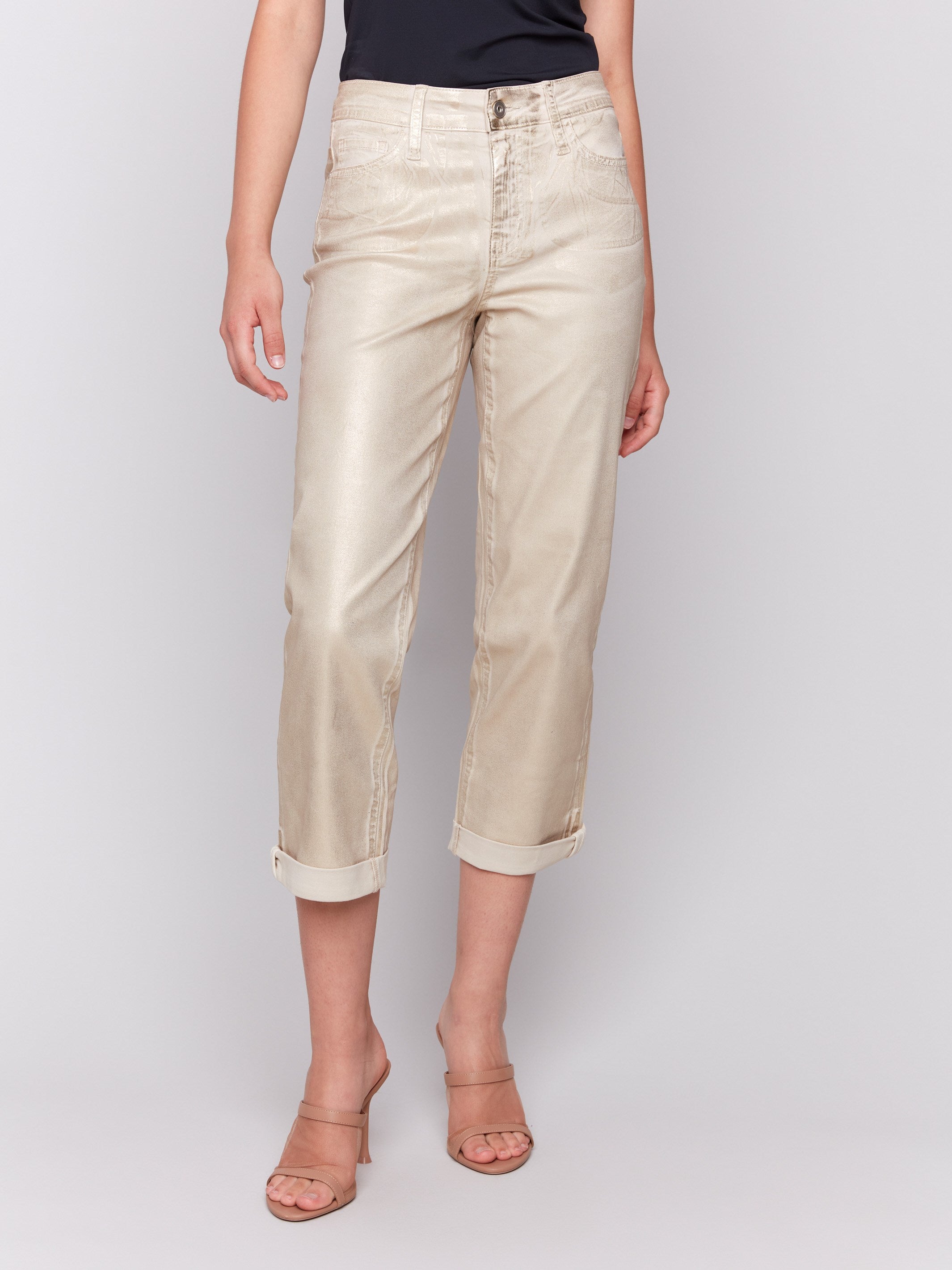 Cropped length pants with button closure and a stylish design by Charlie B.