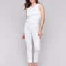 White slim fit twill pants with a frayed hem, ankle-length and mid-rise design by Charlie B.