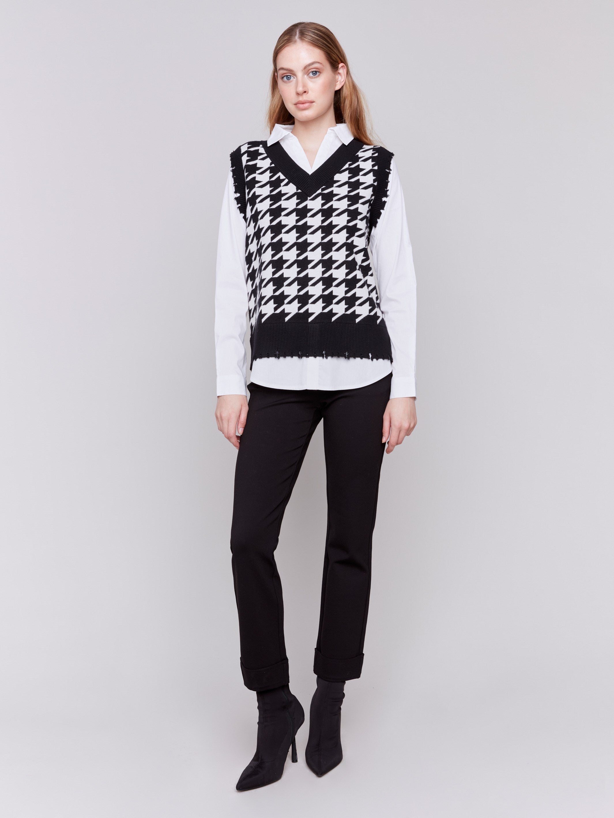 Black and white houndstooth fooler vest with v-neck and poplin shirt collar, hem, and sleeves by Charlie B.