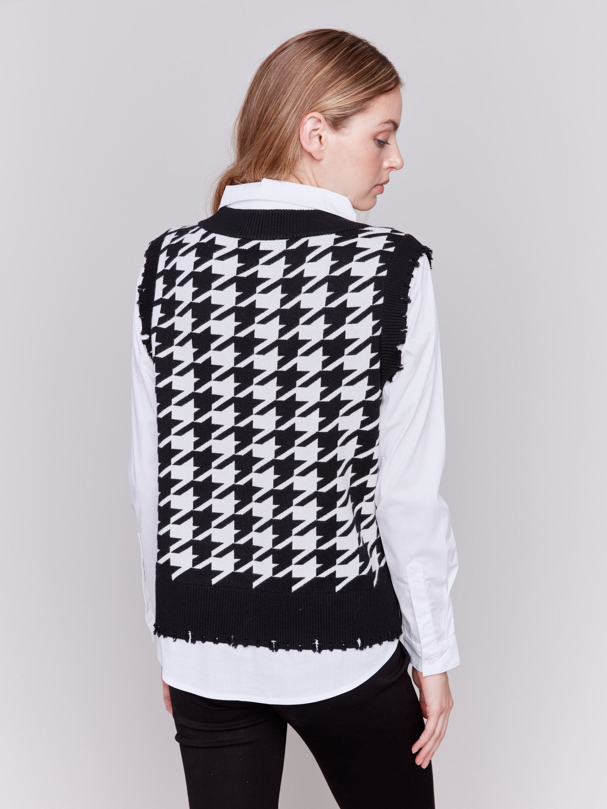 Black and white houndstooth fooler vest with v-neck and poplin shirt collar, hem, and sleeves by Charlie B.