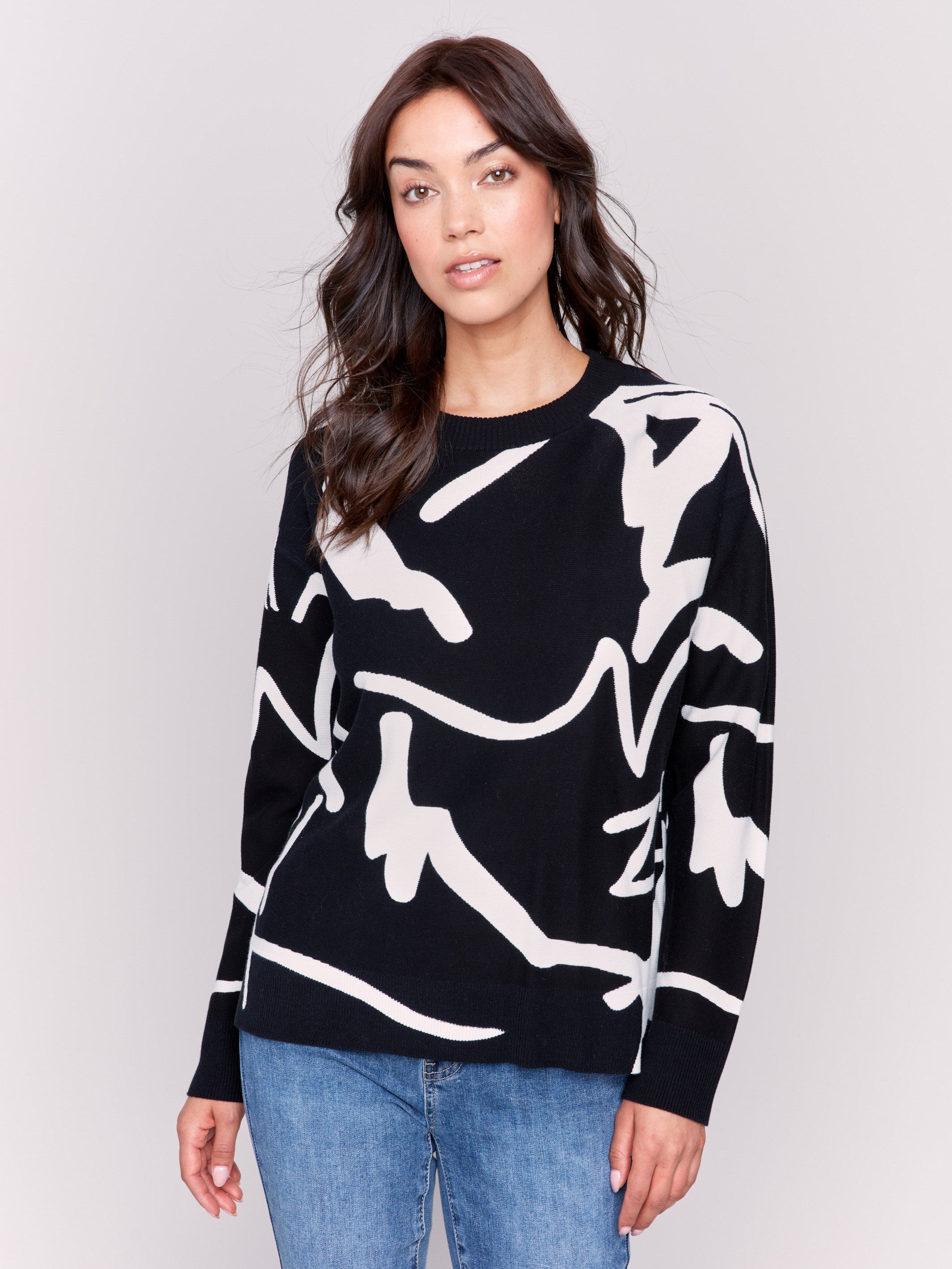 Black and white abstract Jacquard Ottoman Cotton Sweater by Charlie B, featuring a comfortable crew neck and stylish pattern.