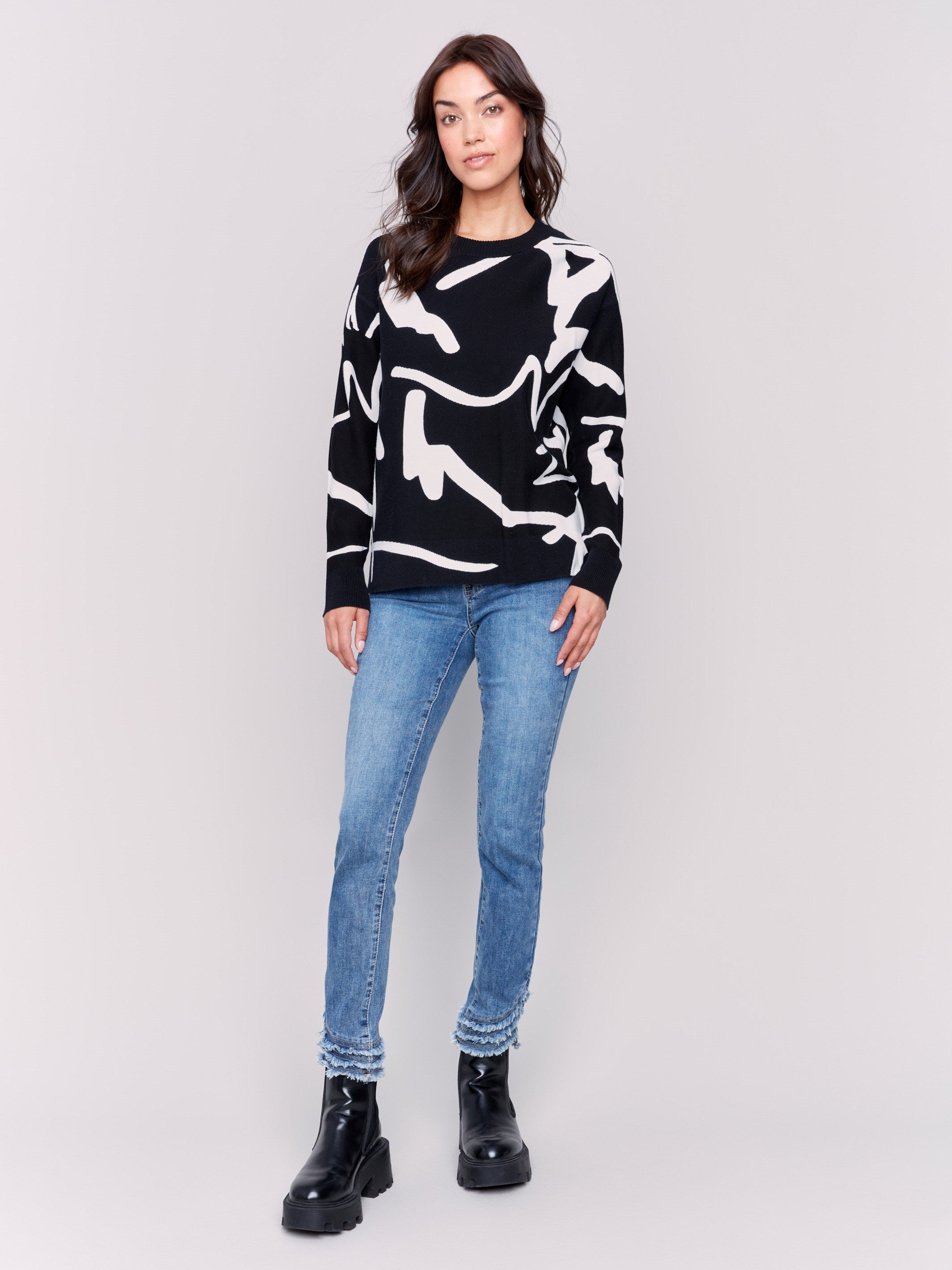 Black and white abstract Jacquard Ottoman Cotton Sweater by Charlie B, featuring a comfortable crew neck and stylish pattern.