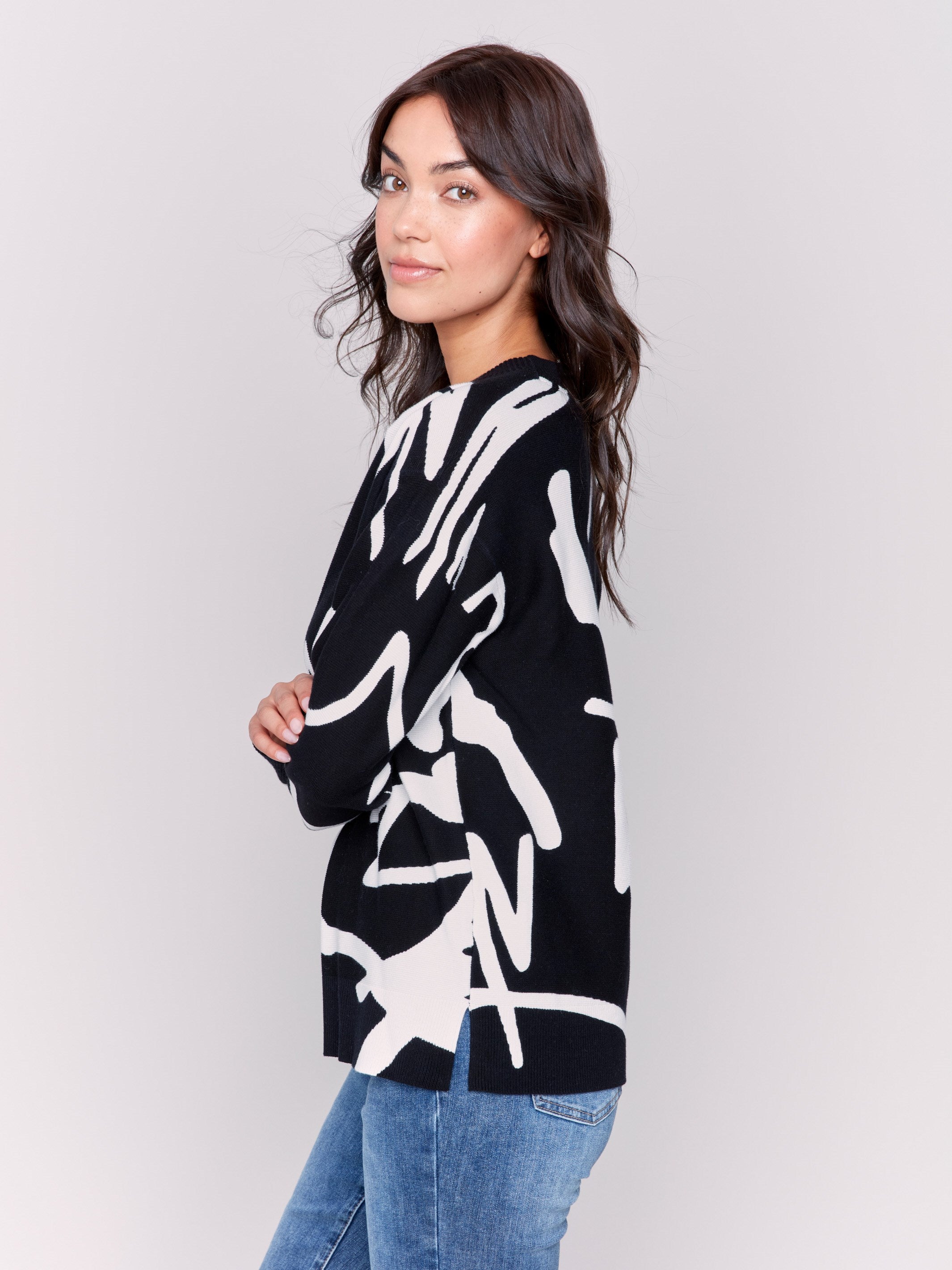 Black and white abstract Jacquard Ottoman Cotton Sweater by Charlie B, featuring a comfortable crew neck and stylish pattern.