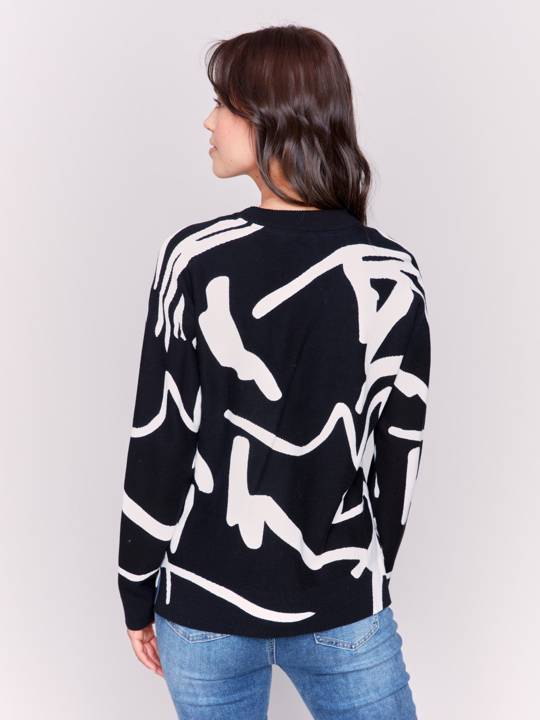 Black and white abstract Jacquard Ottoman Cotton Sweater by Charlie B, featuring a comfortable crew neck and stylish pattern.