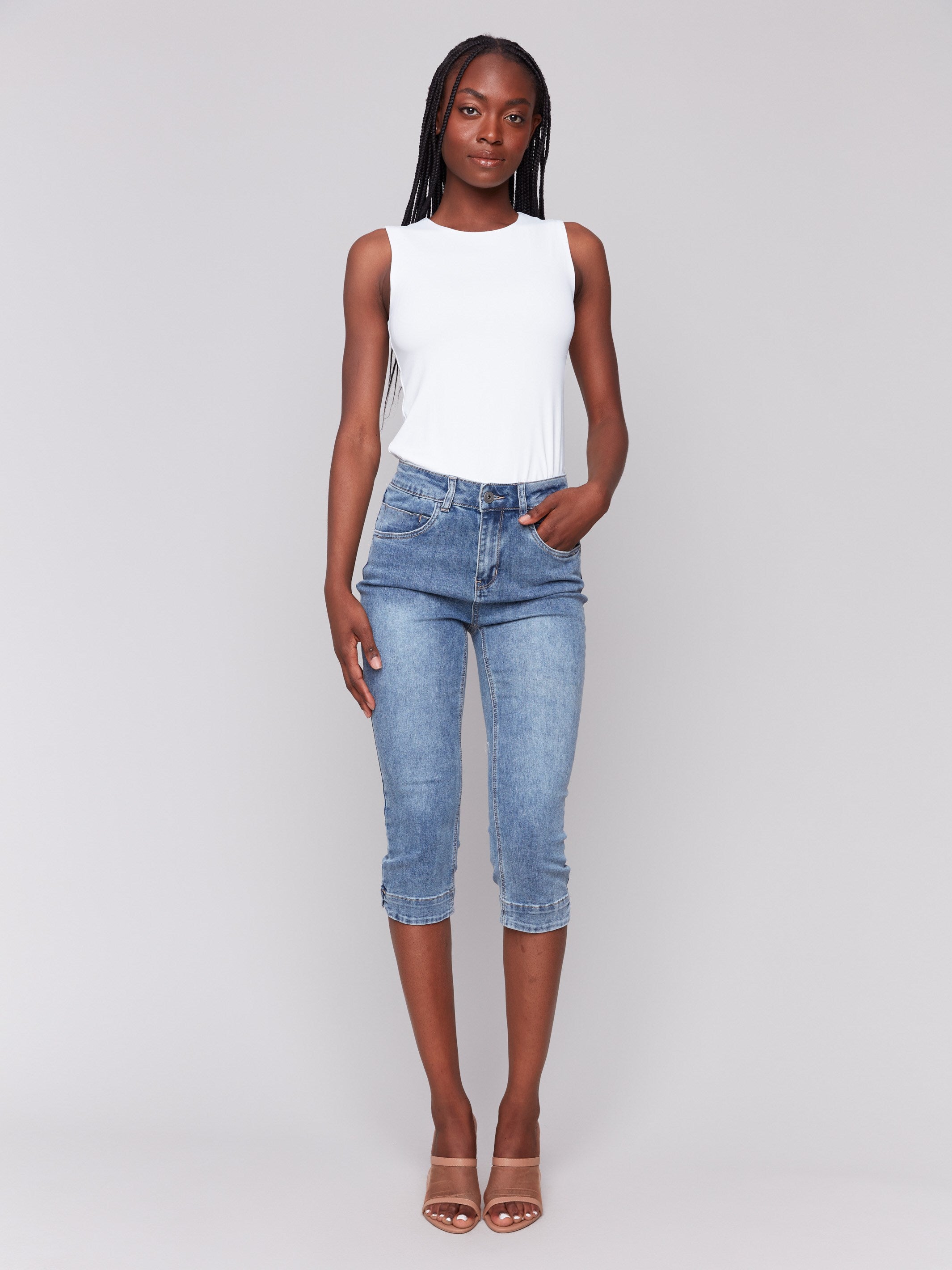 Medium blue Capri jeans with a slim leg fit and regular rise, perfect for casual wear by Charlie B.