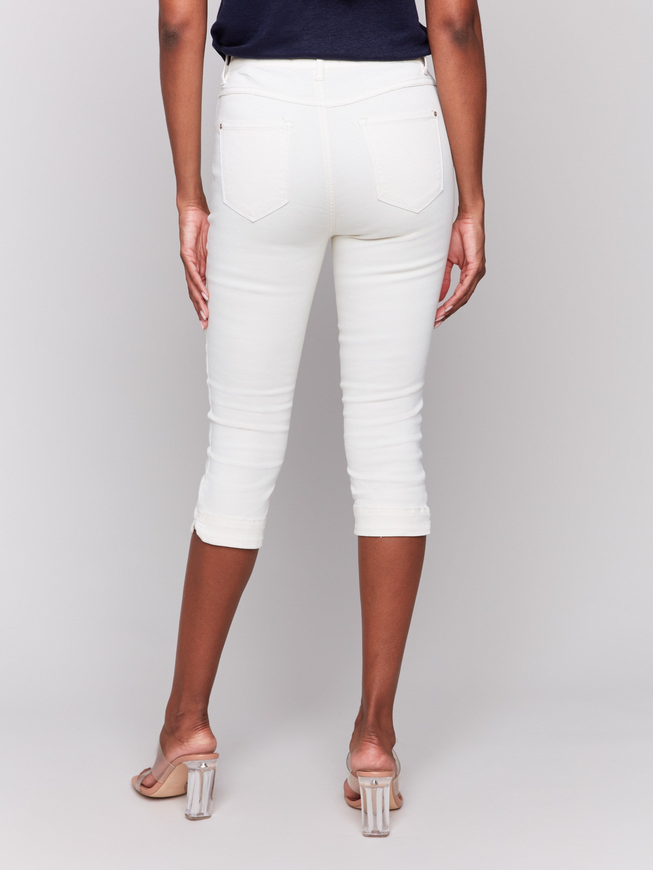 Classic five-pocket style in natural knee-high capris by Charlie B.