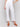 Ankle-length white pants featuring a regular rise design by Charlie B.