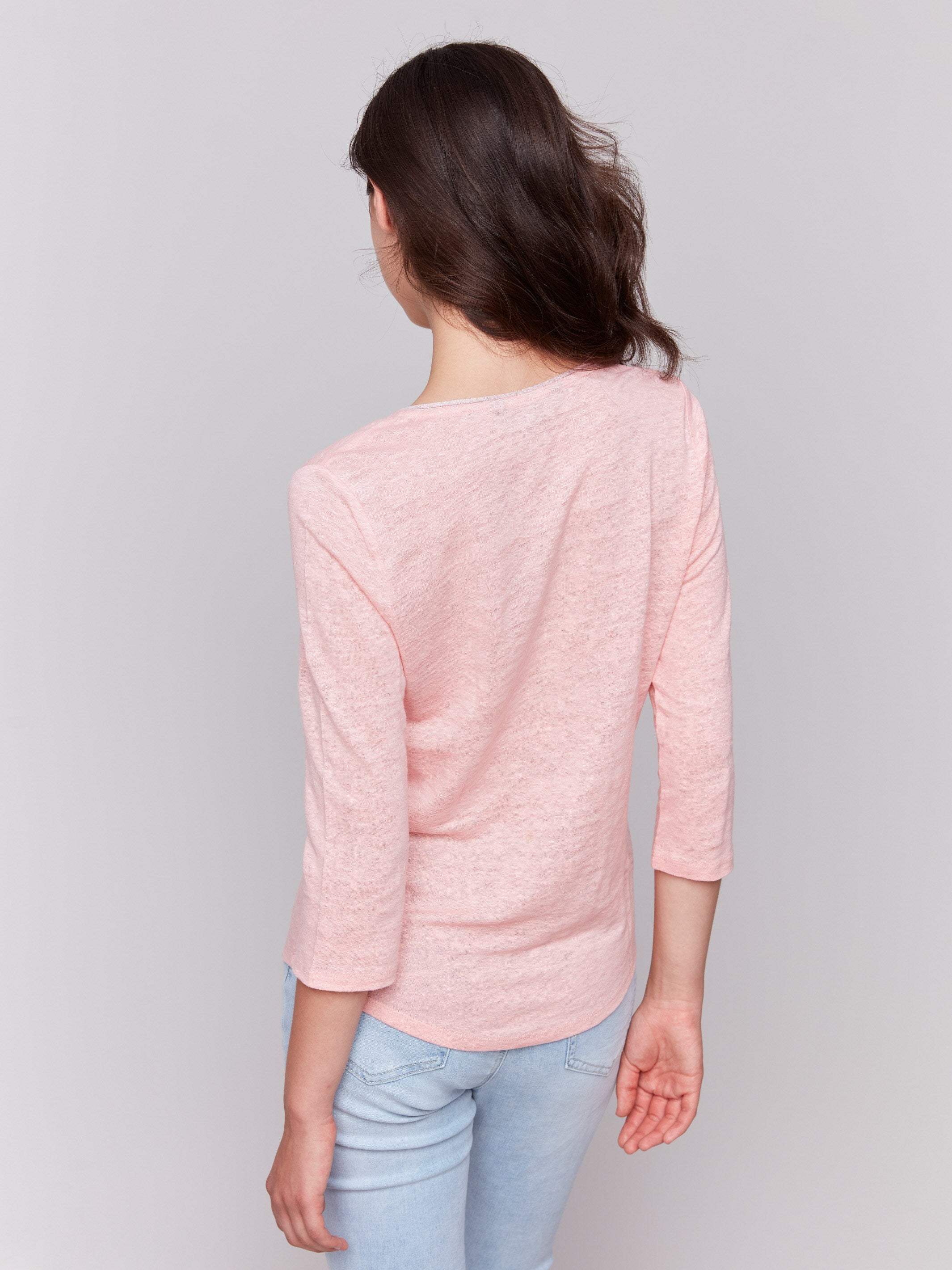 Guava V-neck top with 3/4 sleeves, made from a linen blend with neck trim detail, by Charlie B.