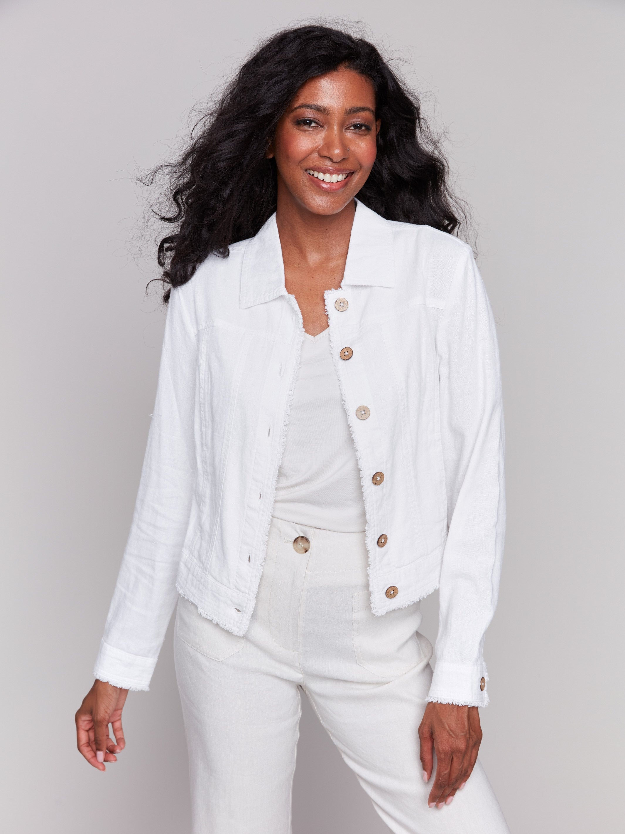 White linen blend jacket with a shirt collar and button closure by Charlie B.