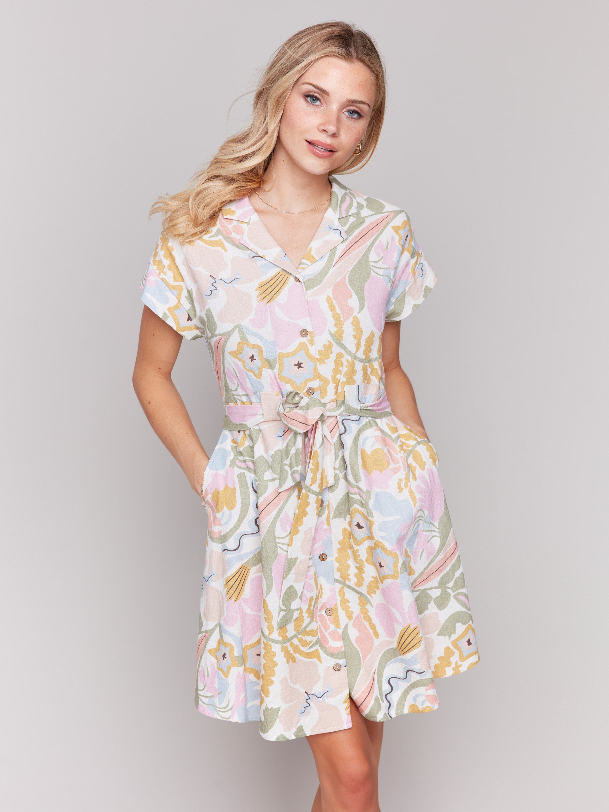 Dress featuring a collar neckline and short sleeves with pastel design by Charlie B.