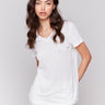 Natural V-neck t-shirt with short sleeves and neckband detail by Charlie B.