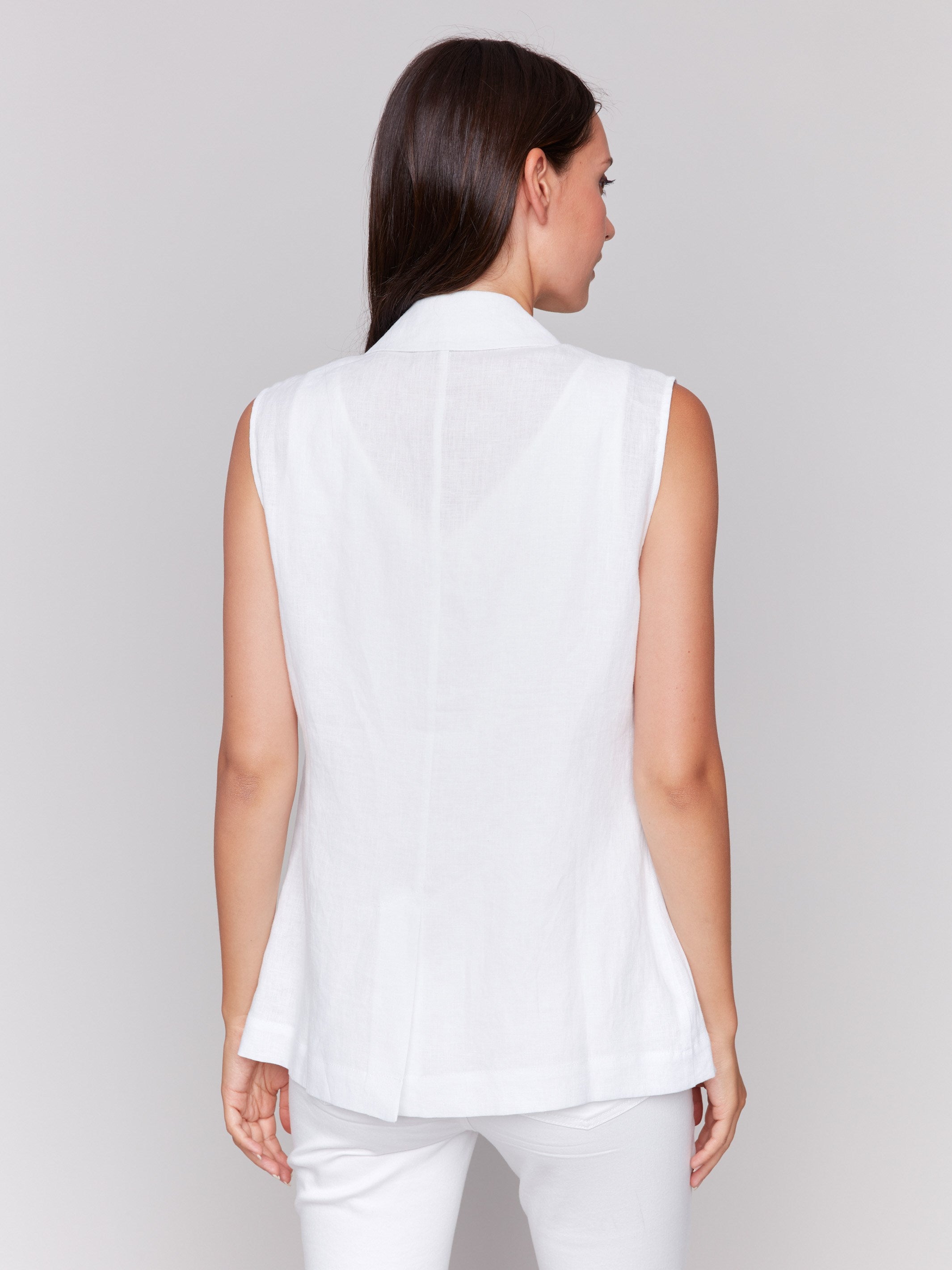 Elegant sleeveless white vest crafted by Charlie B.