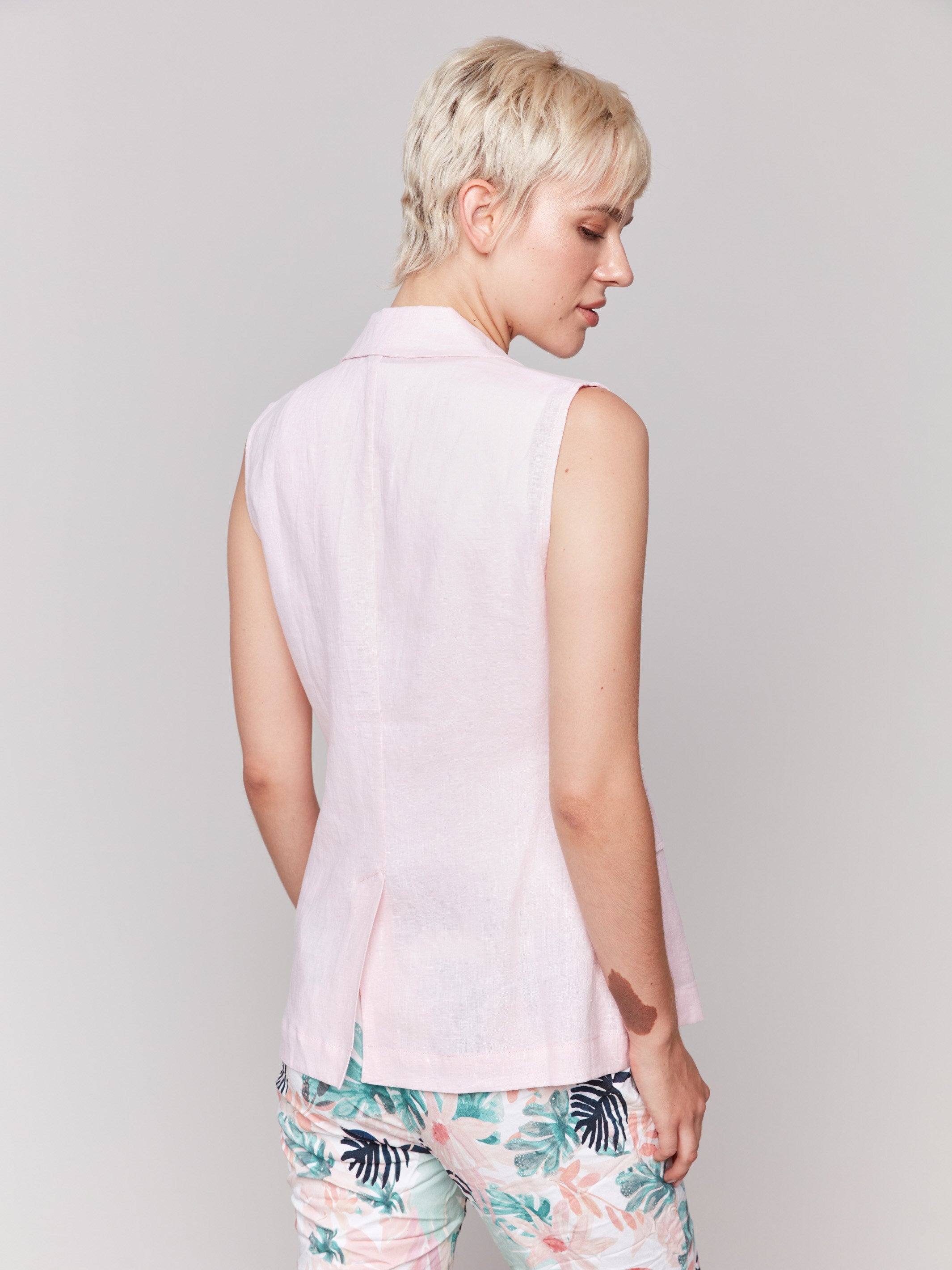 Sleeveless pink vest crafted for comfort by Charlie B.