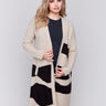 Beige long jacquard knit cardigan with black abstract pattern by Charlie B.