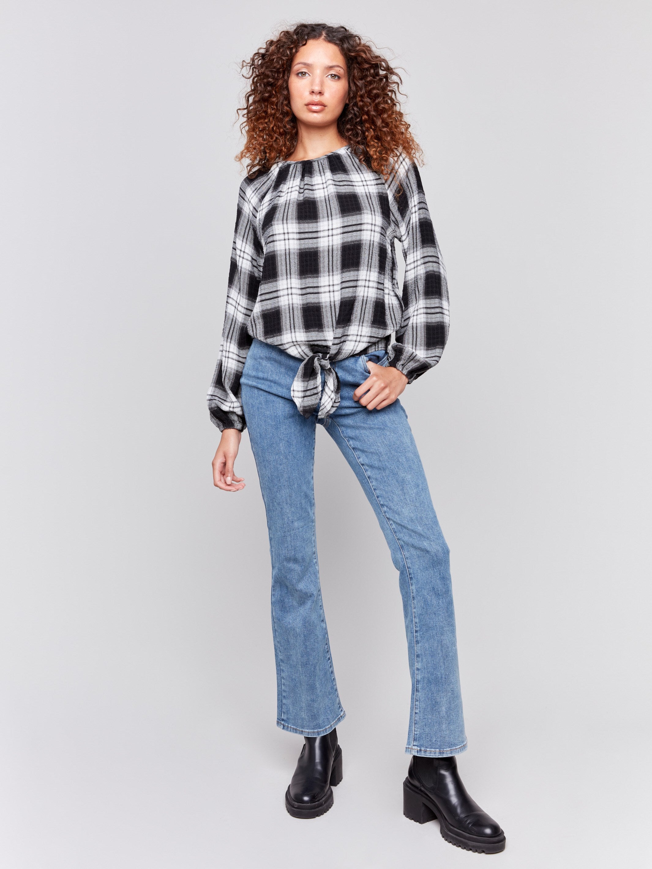 Pepper long-sleeve blouse with balloon sleeves and tie-front detail in a plaid check pattern by Charlie B.