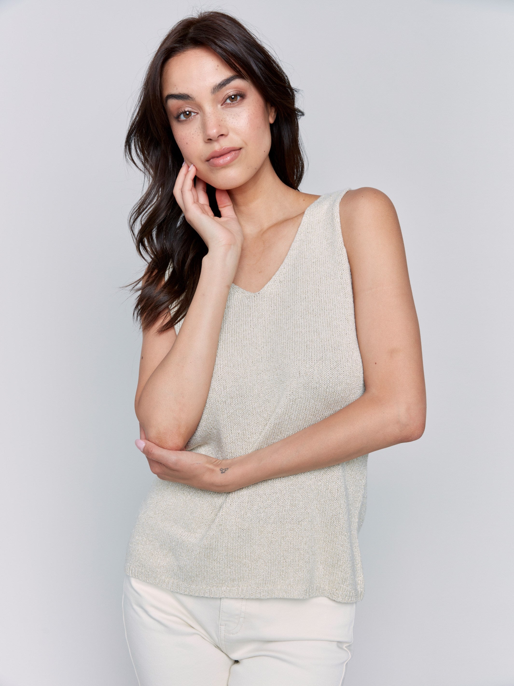 Shimmering gold camisole crafted in luxurious fabric by Charlie B.