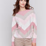 Woodrose-colored long-sleeve sweater with chevron stripes in pink, white, and beige. Crew neckline and ribbed cuffs by Charlie B.