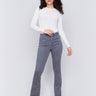 Medium grey flare jeans with ombre hem and stud detailing, featuring a five-pocket design and a regular rise by Charlie B.