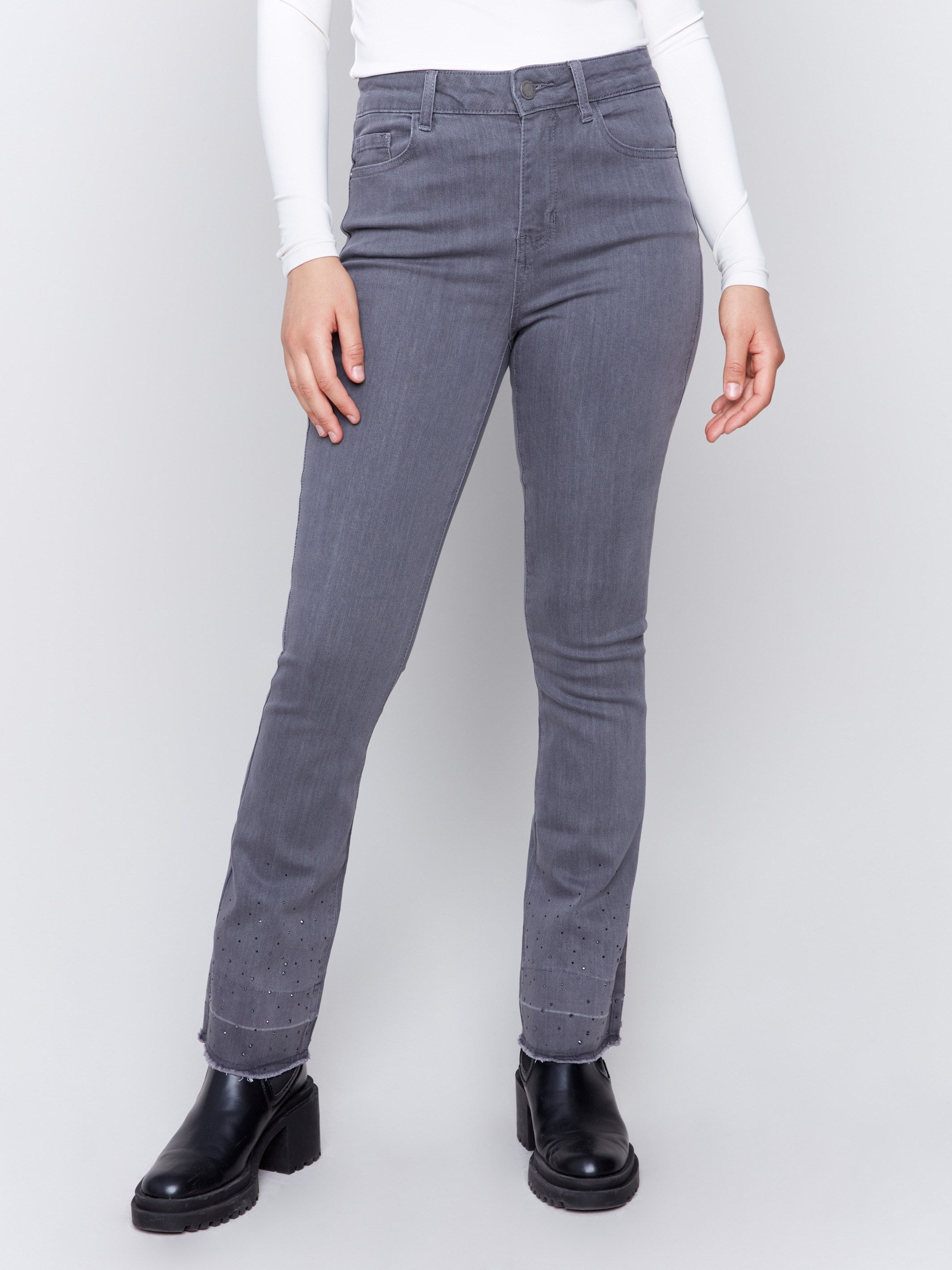 Medium grey flare jeans with ombre hem and stud detailing, featuring a five-pocket design and a regular rise by Charlie B.