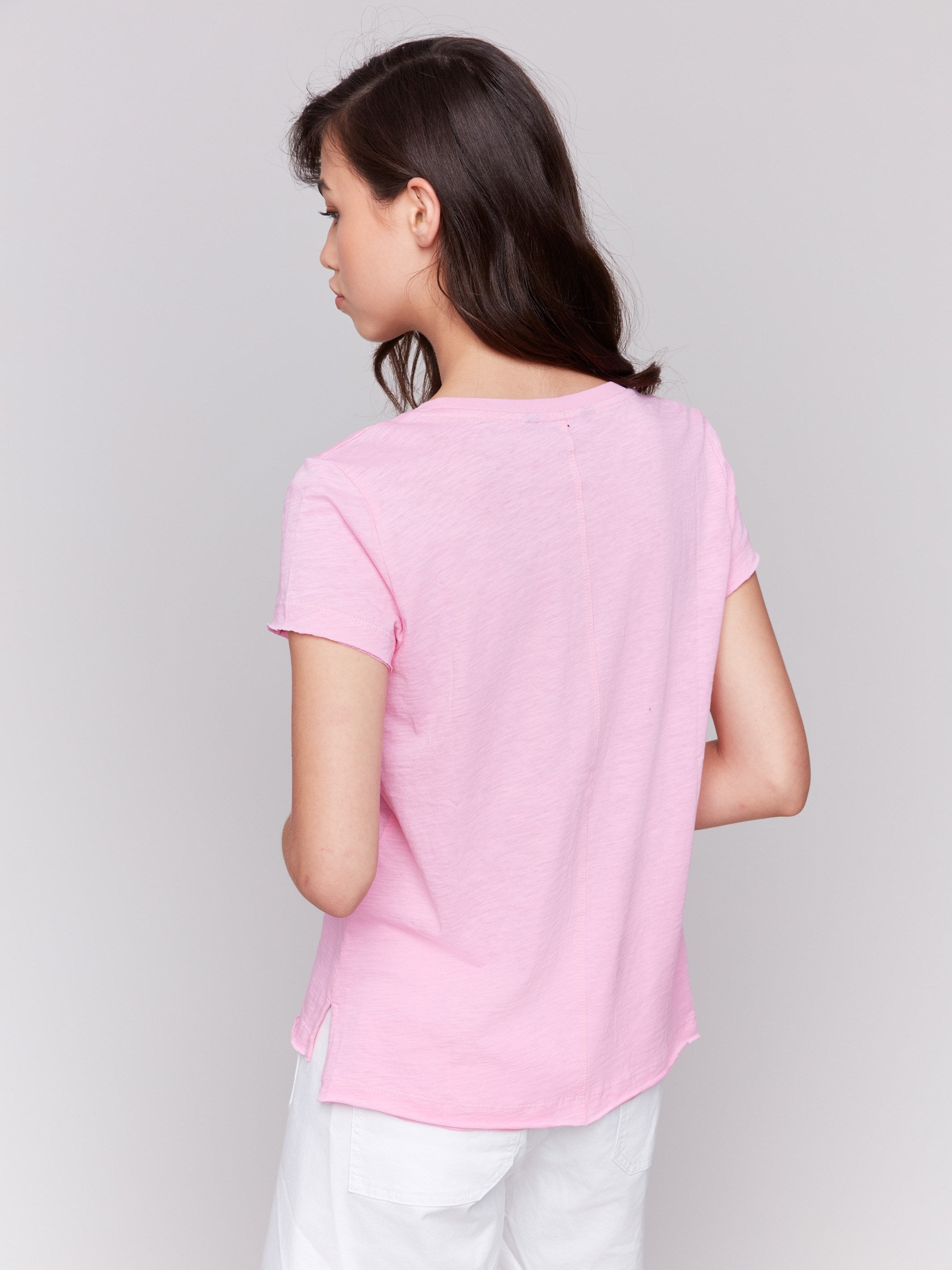 Short-sleeve t-shirt in begonia shade boasting a stylish design, by Charlie B.