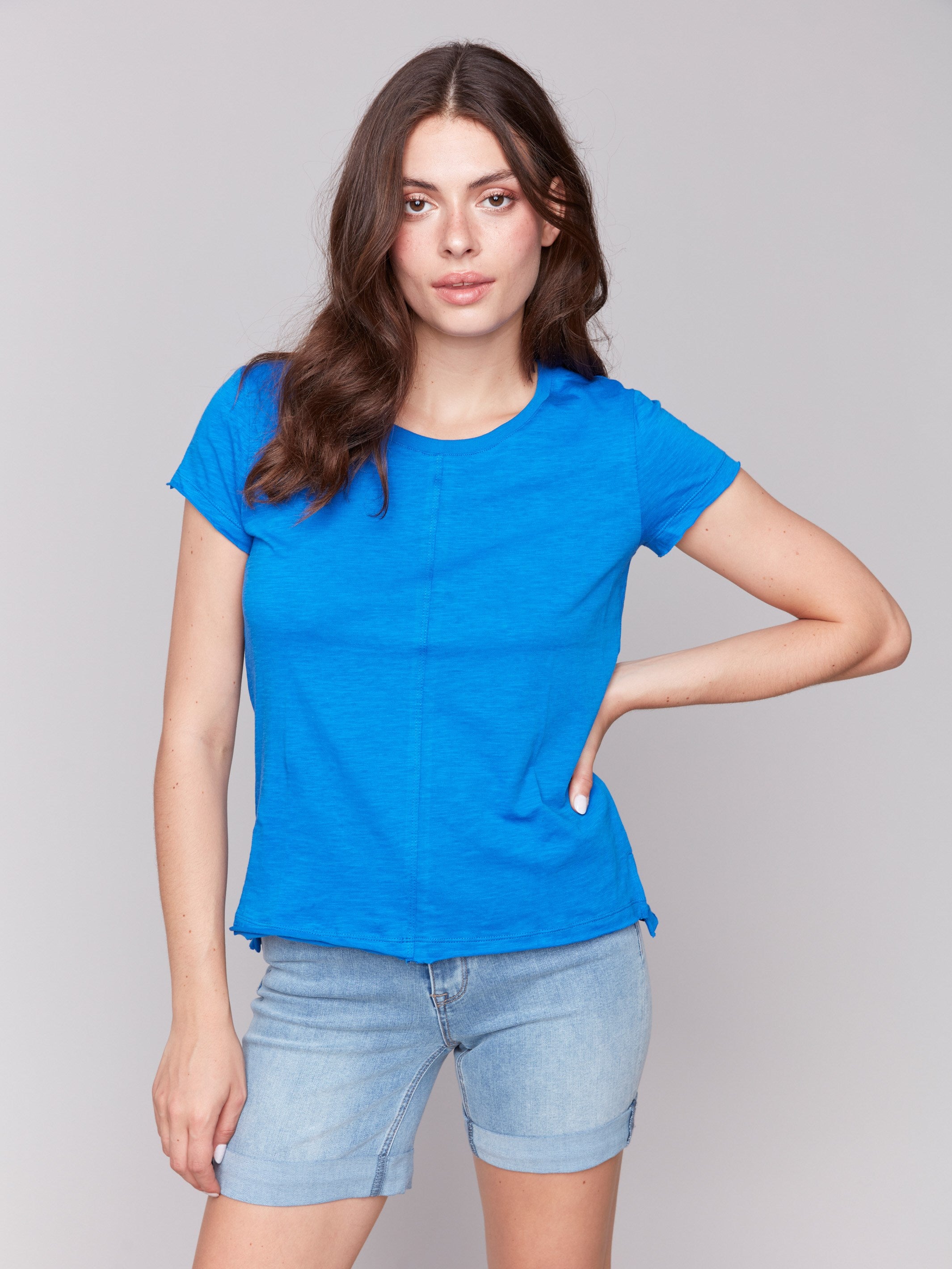 Coastal blue organic cotton t-shirt featuring a classic crew neckline, by Charlie B.