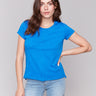 Coastal blue organic cotton t-shirt featuring a classic crew neckline, by Charlie B.