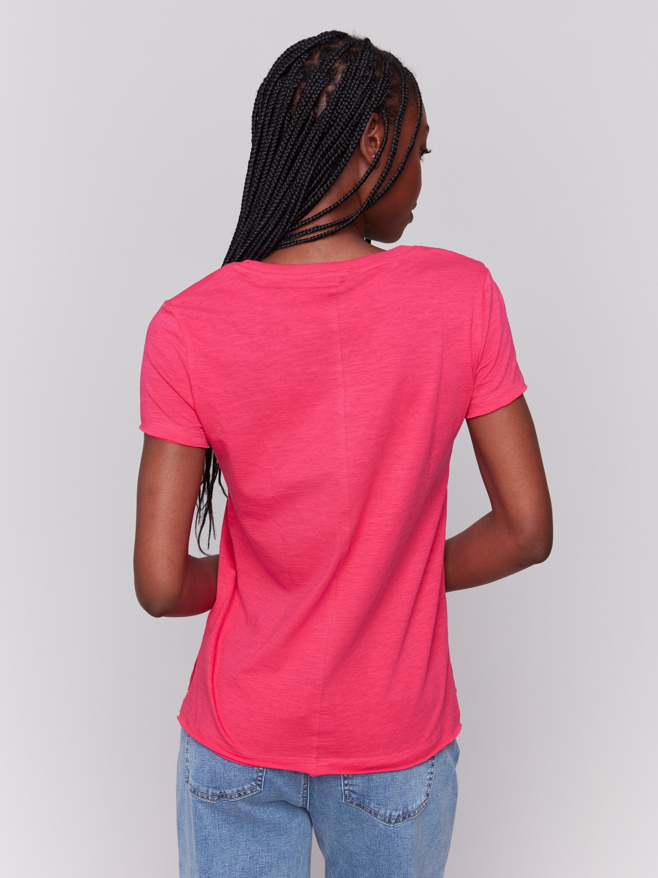 Side slits enhance the Paradise organic cotton t-shirt's design, by Charlie B.