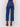 Indigo blue jeans with front patch pockets and a flared leg, featuring a mid-rise by Charlie B.