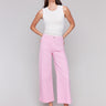 Begonia flare twill pants featuring front patch pockets with a regular rise, button closure by Charlie B.