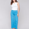 Blue flare twill pants featuring front patch pockets with a regular rise, button closure by Charlie B.