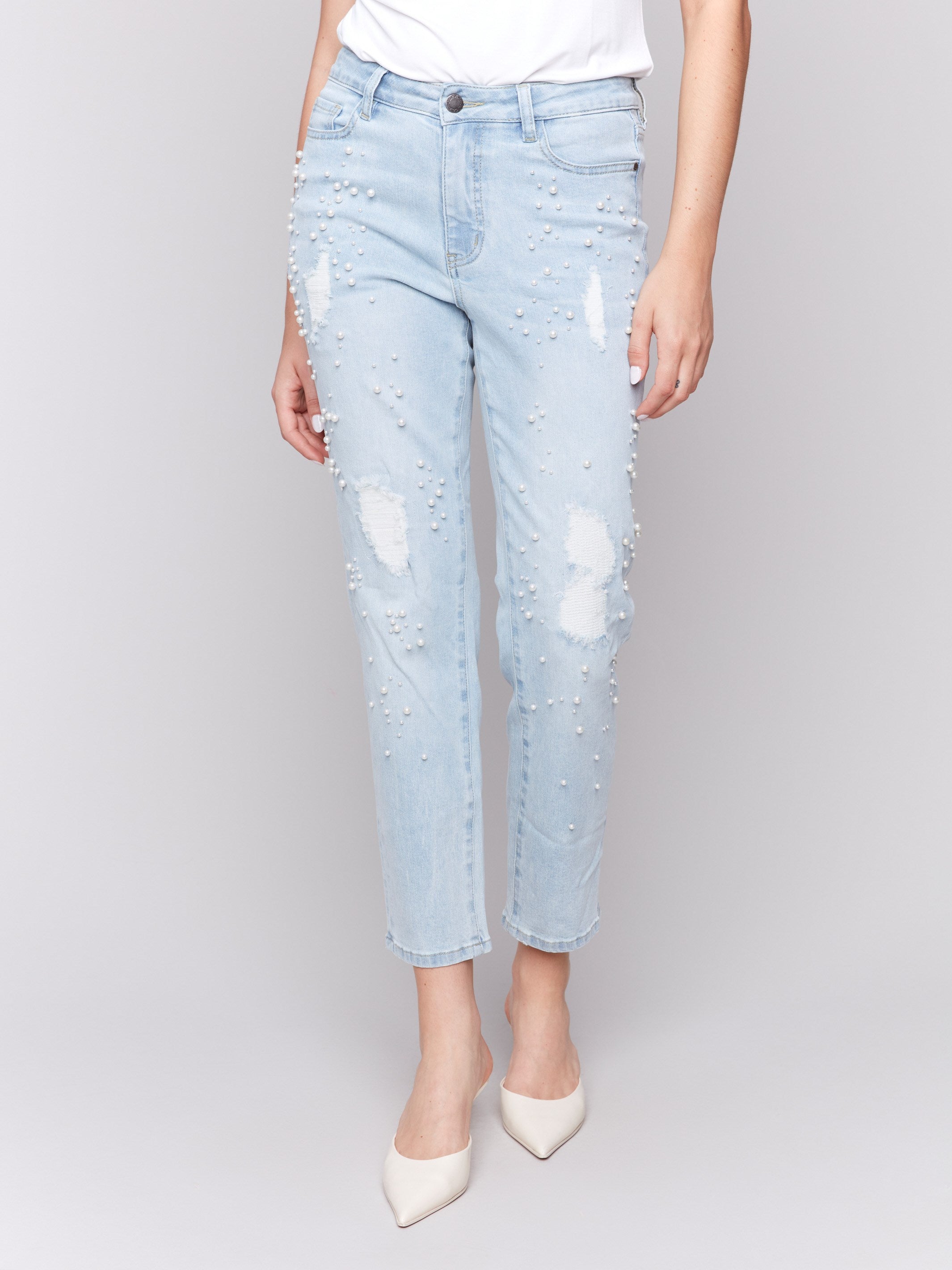 Distressed detail jeans in stretch denim material by Charlie B.