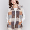 Terracotta colored plaid bouclé knit vest with spread collar and button closure by Charlie B.