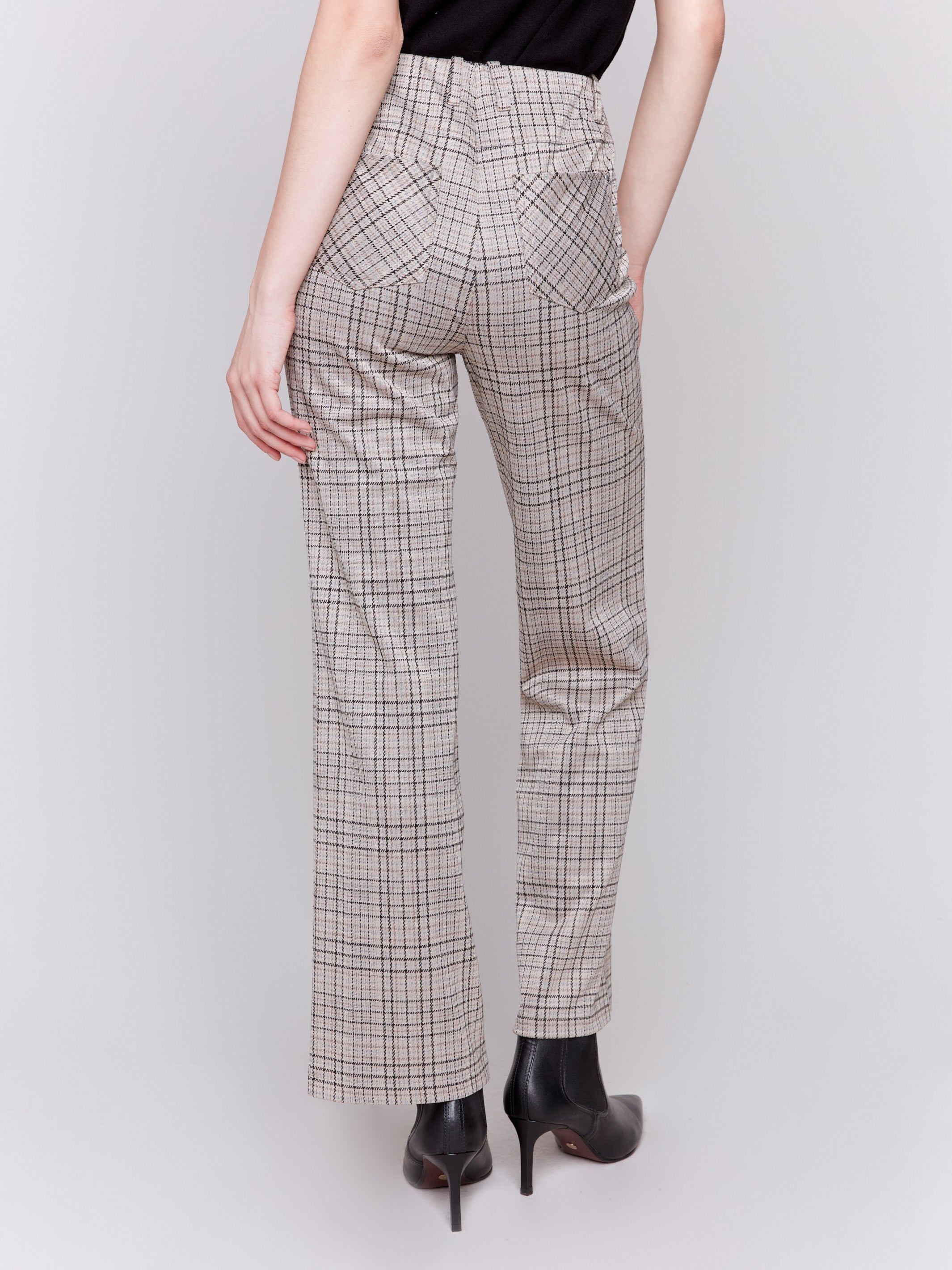 Almond-colored houndstooth plaid pull-on flared pants with high rise and back pockets by Charlie B.