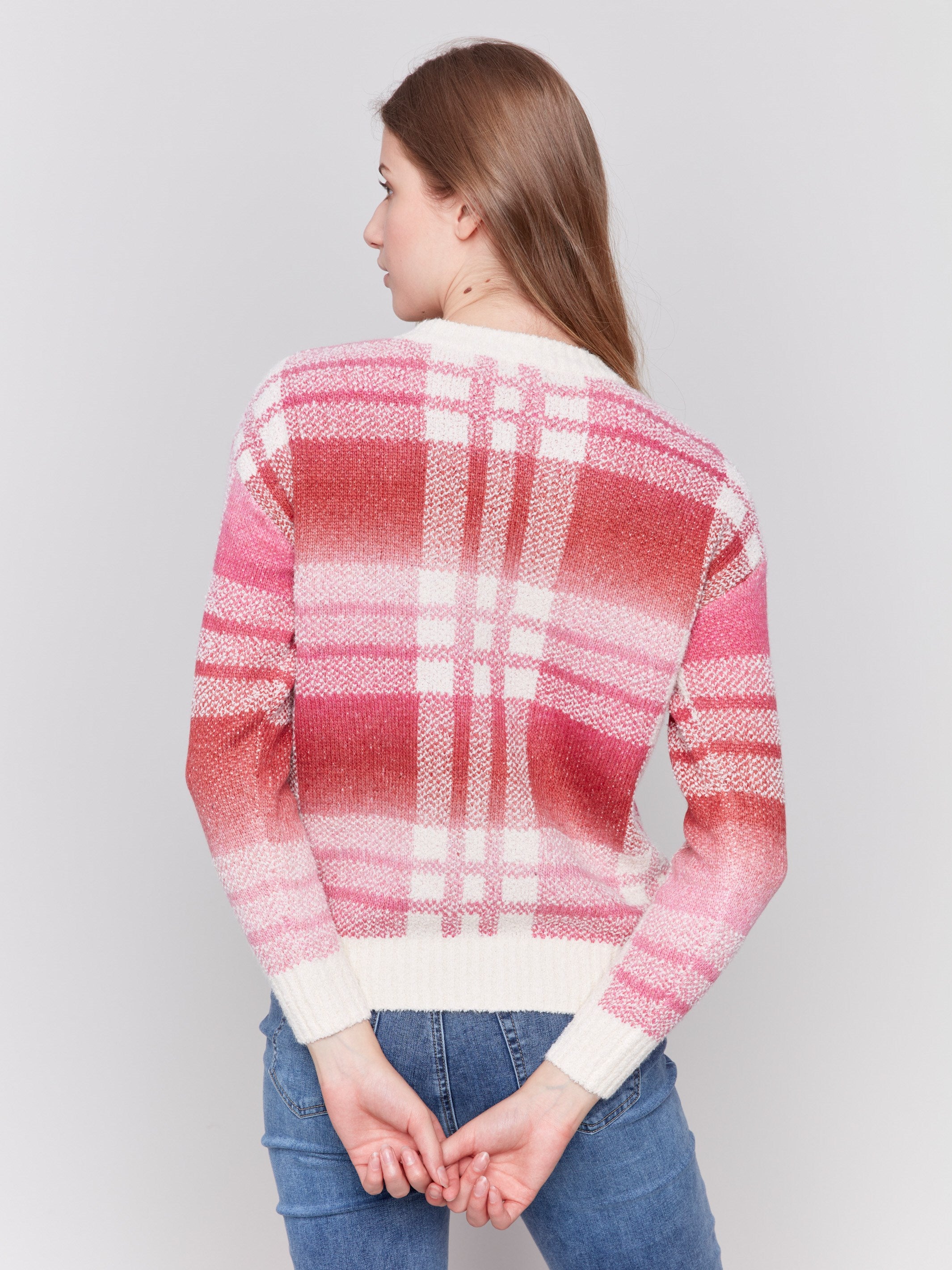 Long-sleeve plaid sweater in magenta with space dye design by Charlie B.