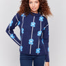 Navy sweater with blue floral print and a round neckline by Charlie B.