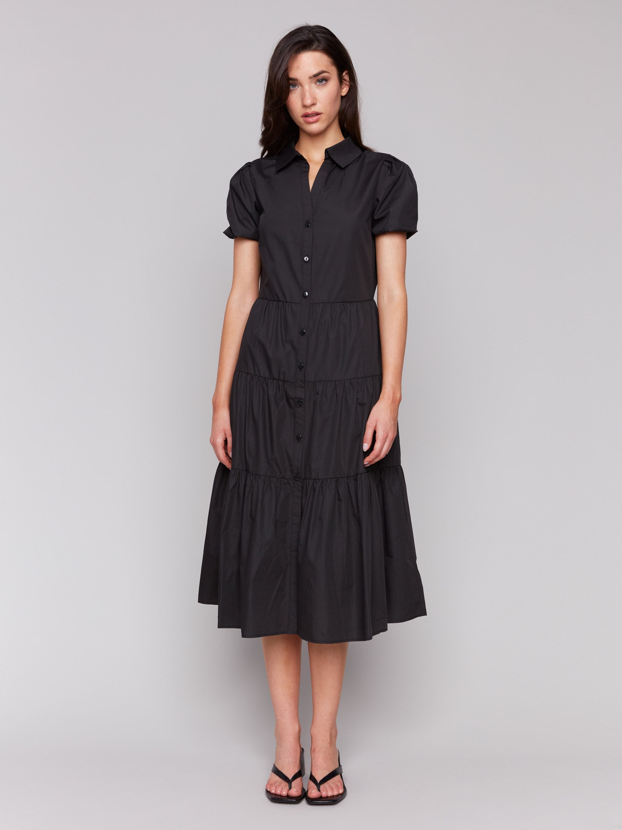 Sophisticated black midi dress with tiered design by Charlie B.